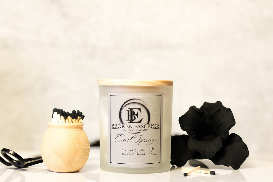Broken Esscents hand-poured candle glowing in the dark